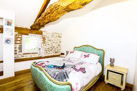 Granary bedroom with exposed beams