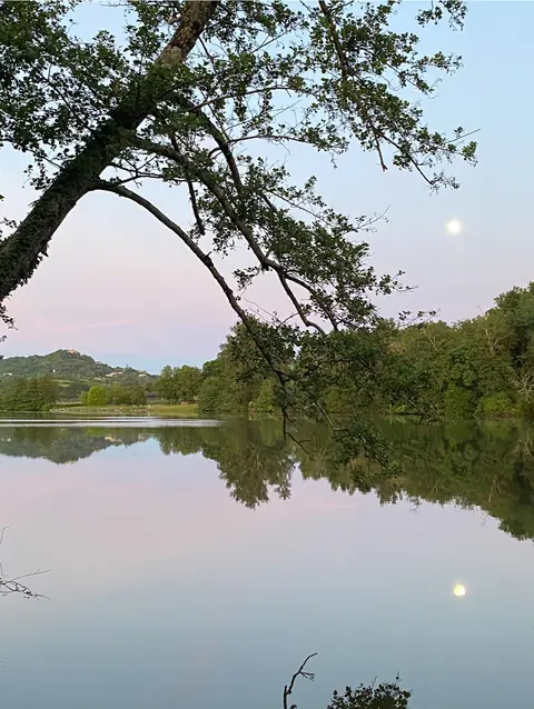 River Lot at dusk with moonrise